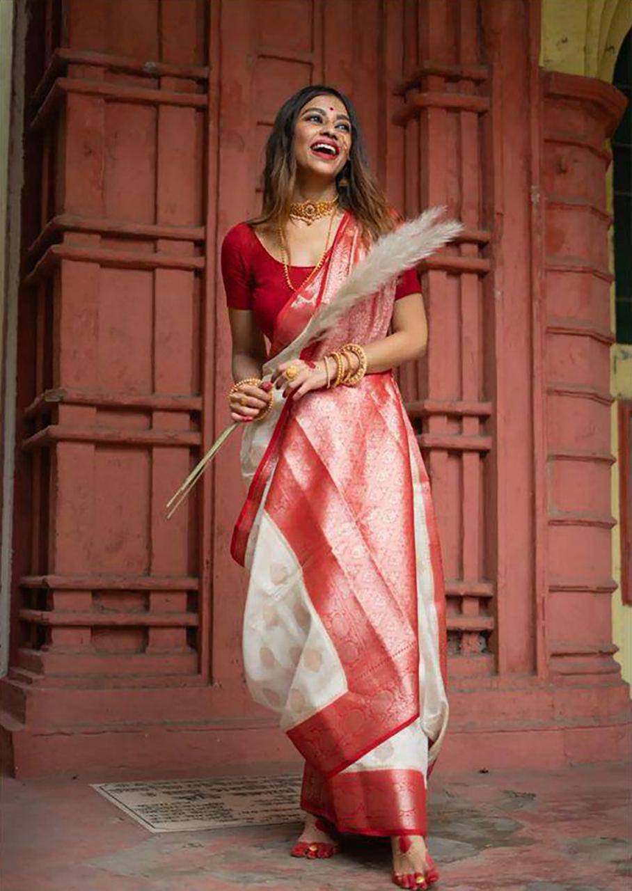 Traditional White Lichi Silk Saree with Bold Red Border and Golden Accents