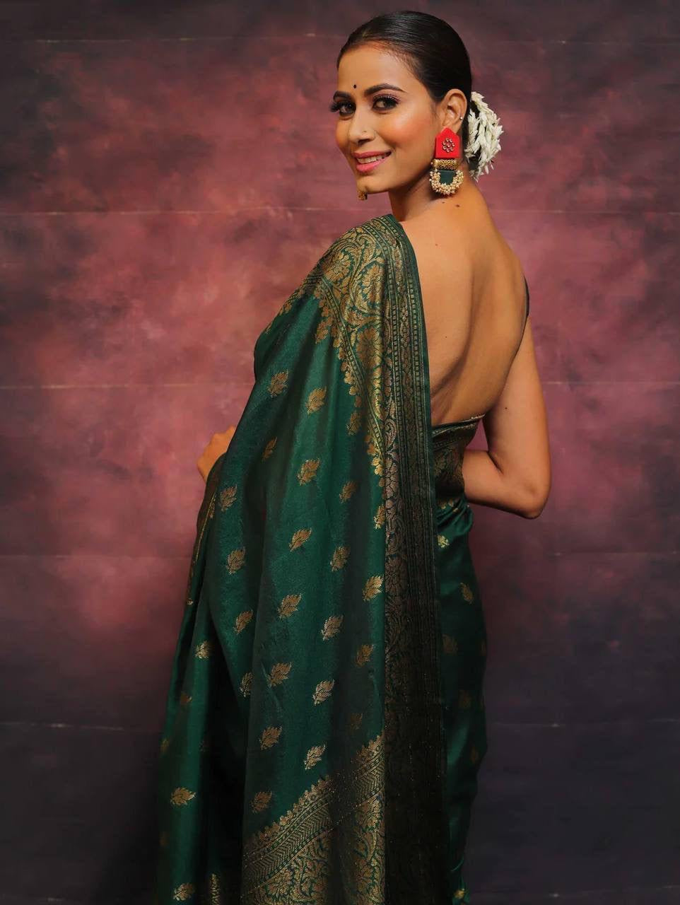 Adorning Dark Green Soft Silk Saree With Prominent Blouse Piece