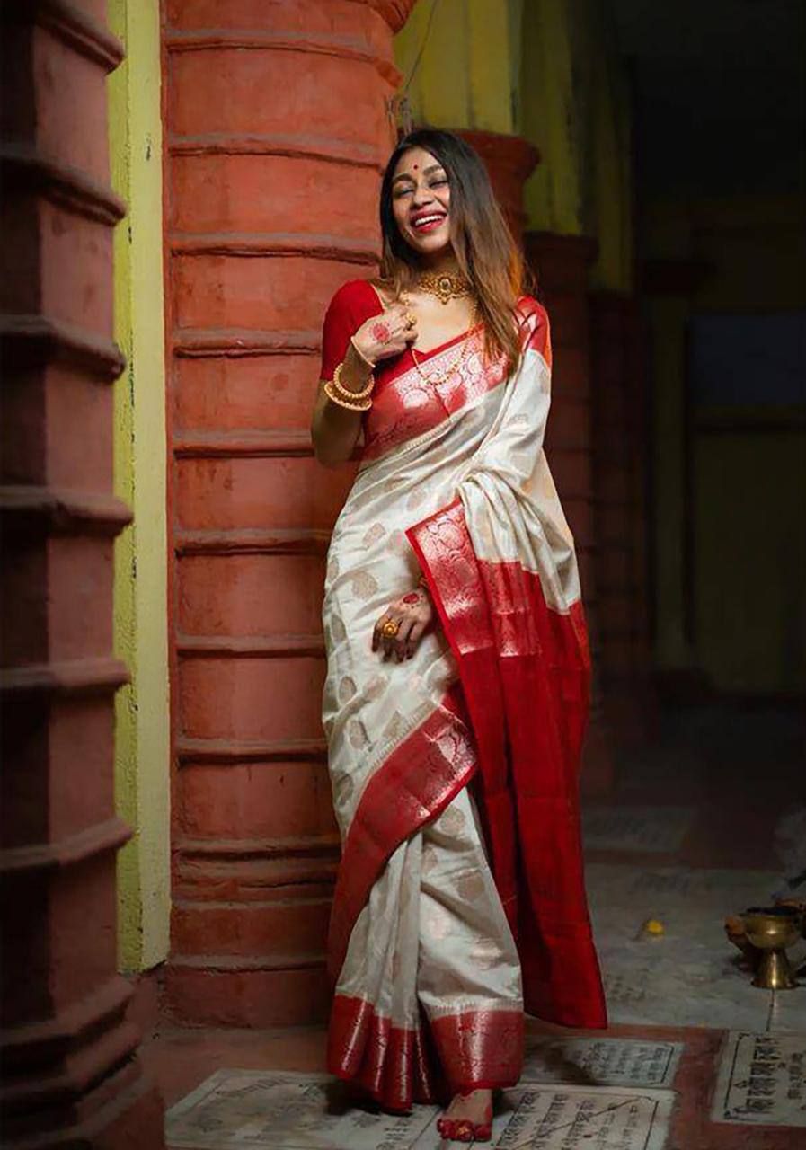 Traditional White Lichi Silk Saree with Bold Red Border and Golden Accents