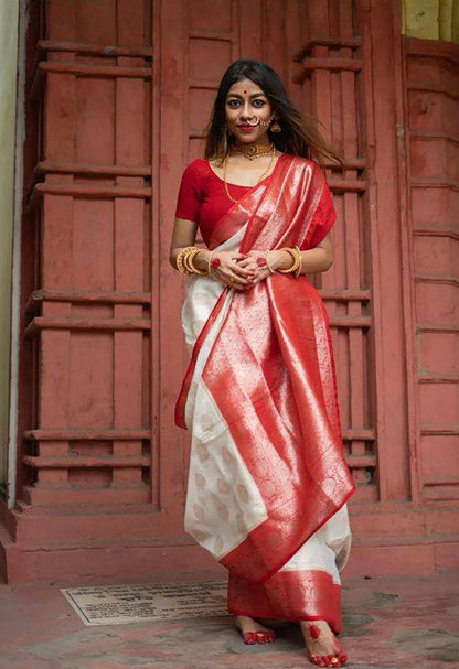 Traditional White Lichi Silk Saree with Bold Red Border and Golden Accents