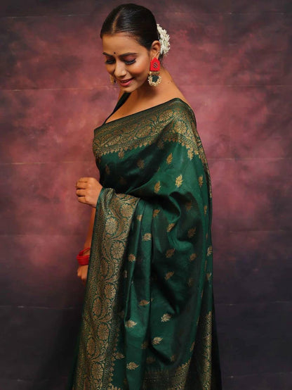 Adorning Dark Green Soft Silk Saree With Prominent Blouse Piece