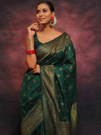 Adorning Dark Green Soft Silk Saree With Prominent Blouse Piece