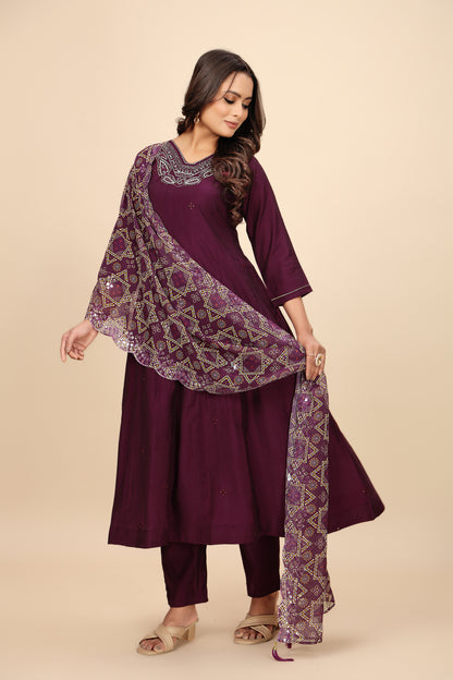 Rich Maroon Three-Piece Suit with Embroidered Details and Sheer Bandhani Dupatta