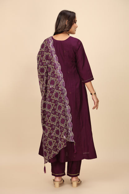 Rich Maroon Three-Piece Suit with Embroidered Details and Sheer Bandhani Dupatta